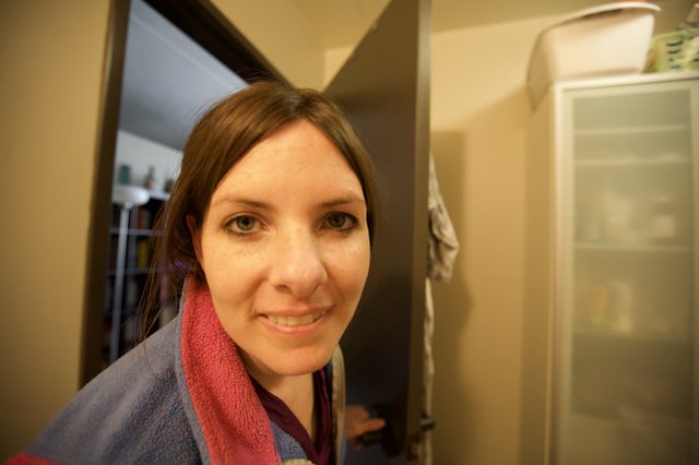 Penelope Smiling in Doorway After Shower
