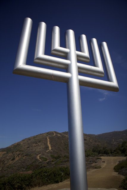 The Menorah Stands Tall Against the Landscape