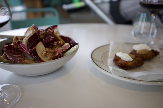 Elegant Bistro Meal with Salad and Fried Appetizer