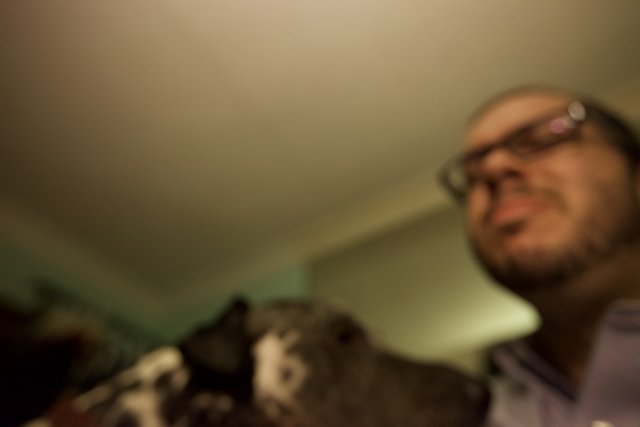 Blurry Portrait of a Man and his Furry Companion