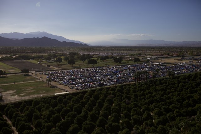 Aerial view of Coachella parking lot surrounded by trees