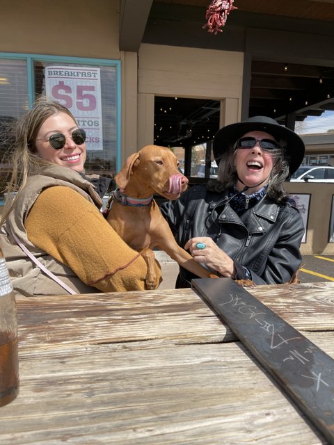 Two Women and a Pup Enjoying a Sunny New Mexico Day