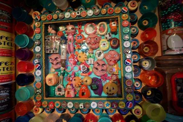 Eclectic Folk Art Assemblage with Vintage Toys and Bottle Caps