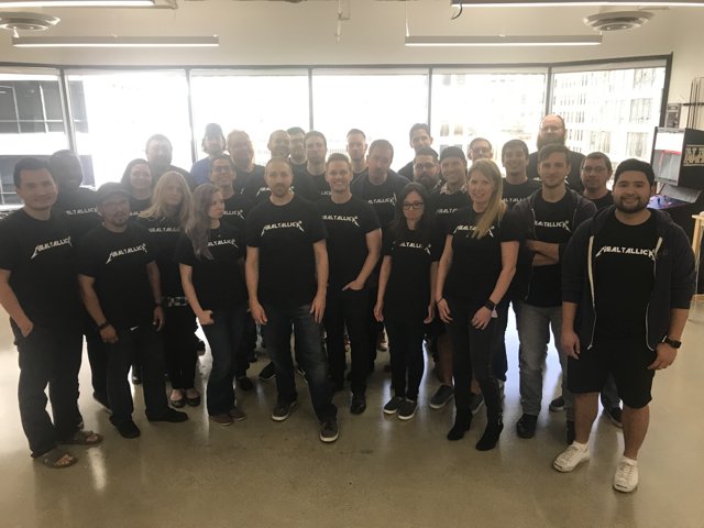 Group of People in Black Shirts