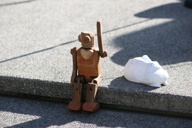 Wooden Toy and White Object