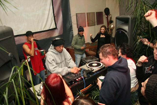 DJ Set in a Foliage-Filled Room