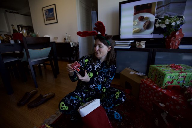 Penelope Opens Christmas Stocking in Skull Onesie