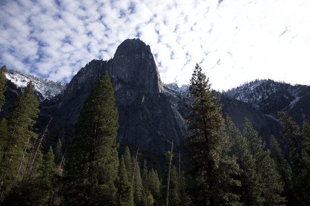 Sentinel Rock Rising Above Yosemite Valley Forest