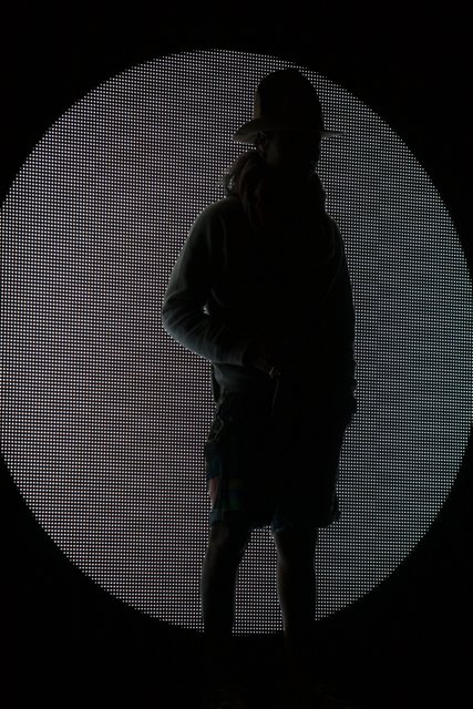Silhouetted Man in Hat