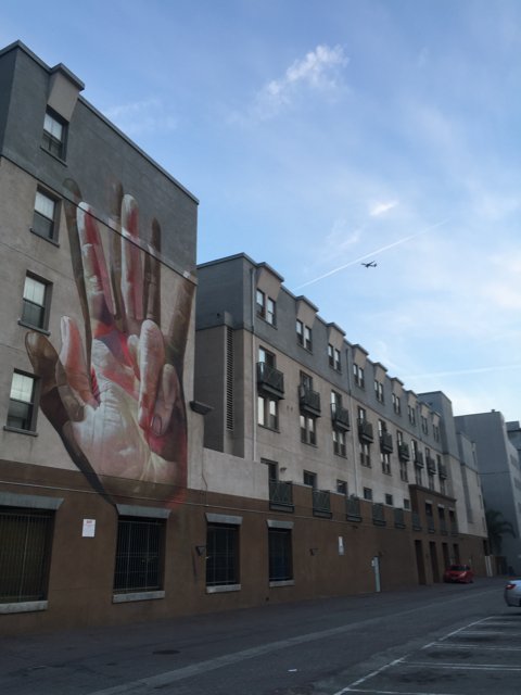 Hand-Painted Mural on Urban Building
