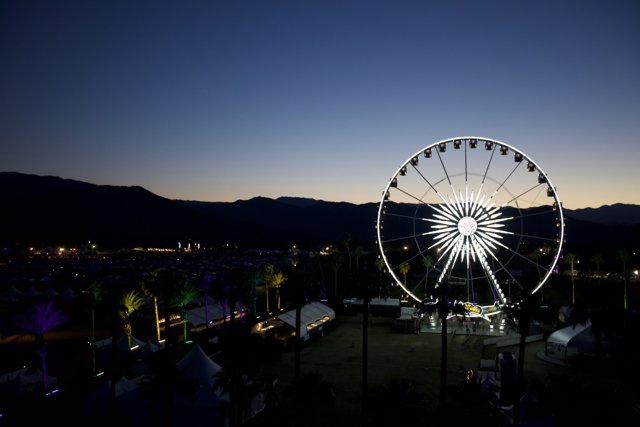 The Glowing Ferris Wheel in the Desert Night