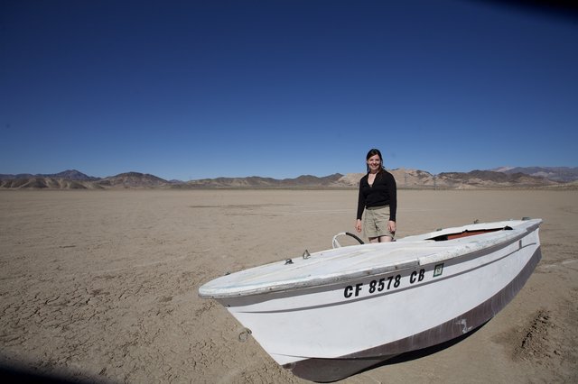 Stranded Boat on a Vast Dry Desert Lakebed