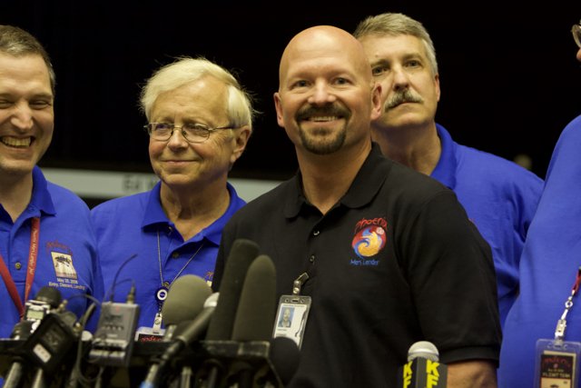 Press Conference with Blue Shirted Men