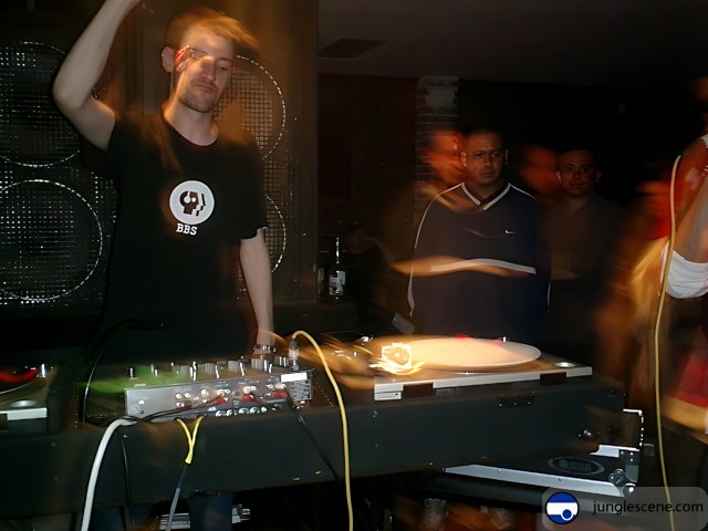 Club DJ spinning energy through the night
