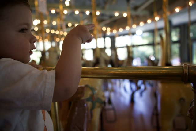 First Carousel Ride: Magic in Motion