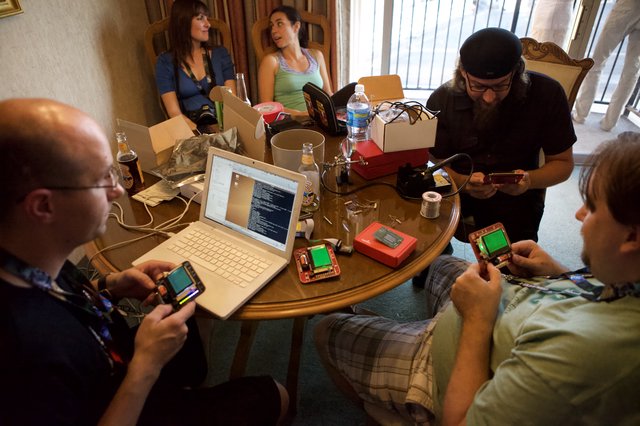 Hackers Gather Around Table at DEF CON 18