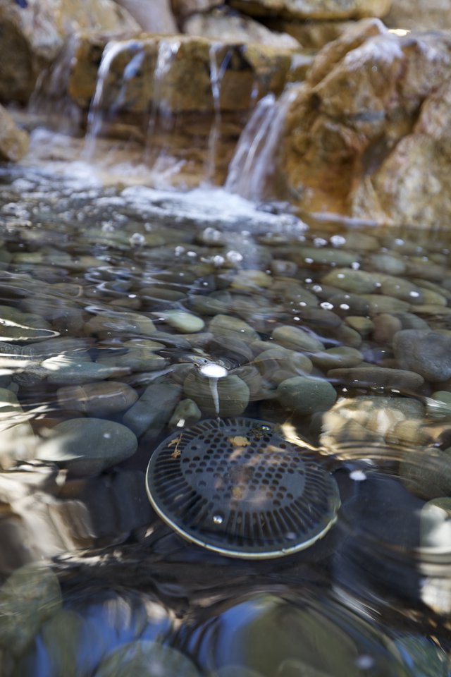 Underwater Fountain Drain with Smooth River Stones