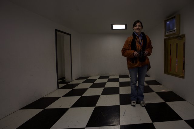 Explorer Smiling in Checkered Room at Exploratorium