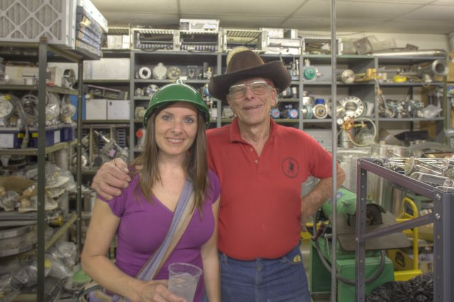 Two Visitors Pose Inside Black Hole Surplus, Santa Fe