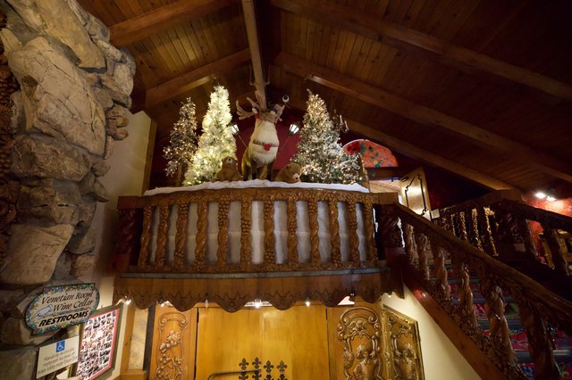 Festive Christmas Display in Rustic Mountain Lodge Interior