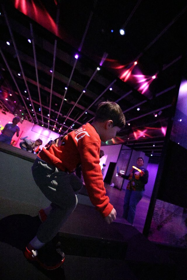Child in Red Hoodie at Baby Rave Event