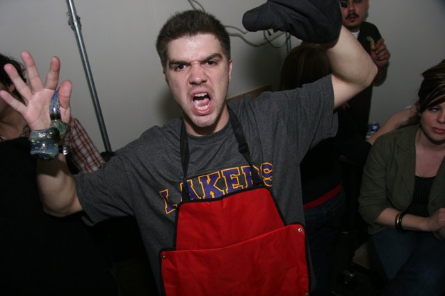 Apron-wearing Man in the Kitchen