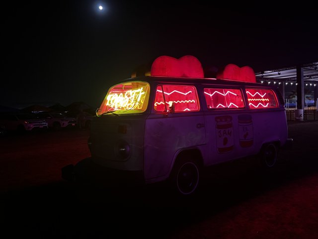 Neon Van Glowing Under the Night Sky