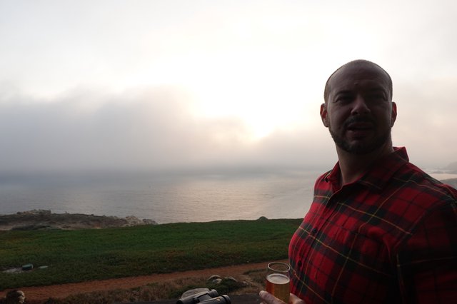 Sunset Beer by the Misty Coastline