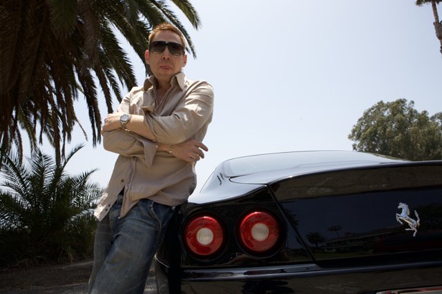 Man and Machine: Posing with a Ferrari