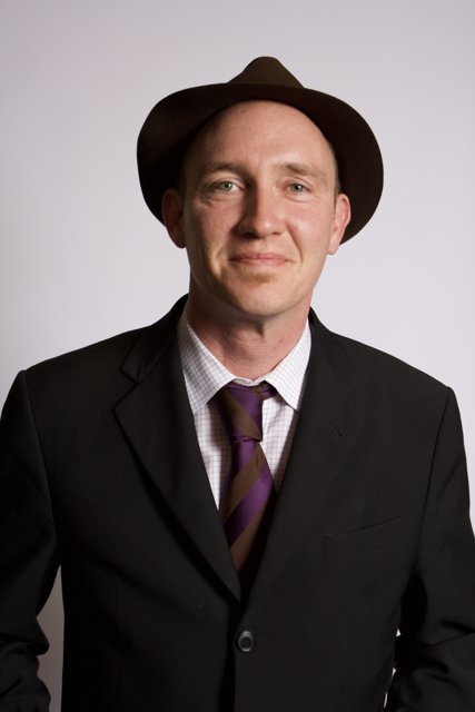 Dapper Man in a Suit and Hat