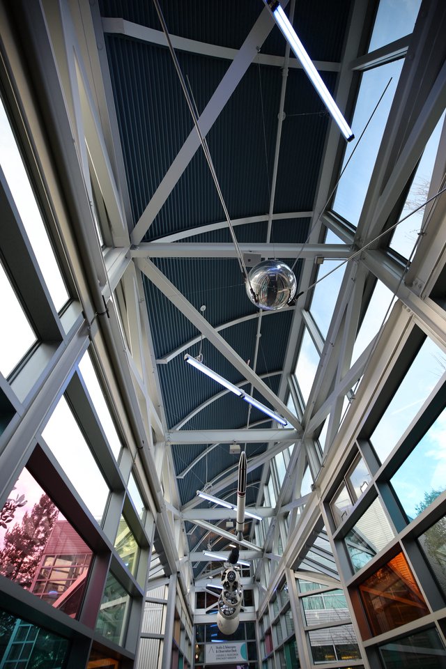 Modern Glass Corridor with Structural White Beams
