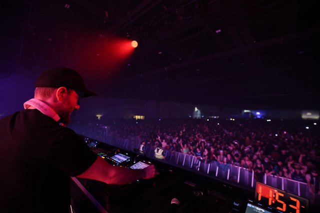 DJ Commands Massive Festival Crowd from the Stage