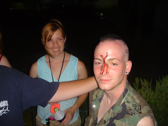 Punk Festival Goer with Theatrical Bloody Makeup