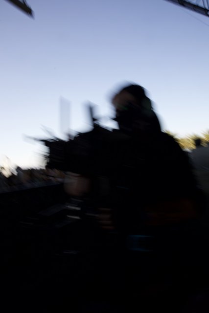Mystery in Motion: Silhouette of a Man at Dusk