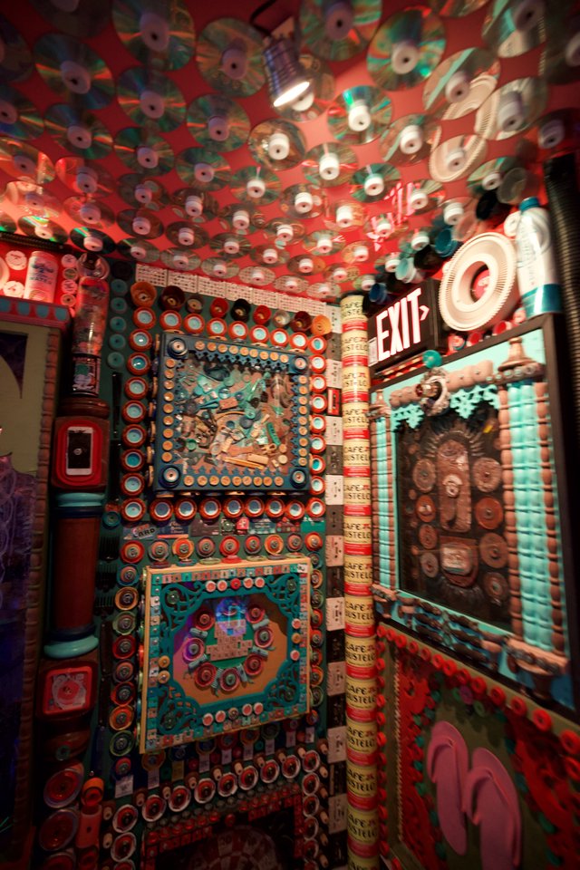 Immersive Found Object Art Installation with CDs and Vintage Materials