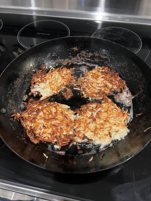 Crispy Fried Potatoes on a Cooking Pan