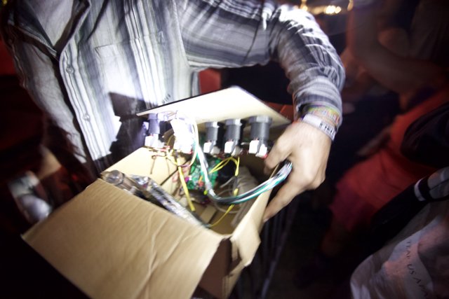 Man with a Box of Wires
