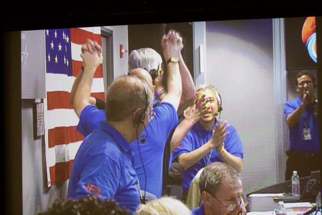 Blue-clad Group Applauding Patriotism