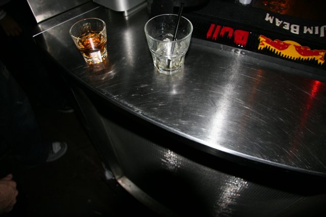 Bar Counter with Liquor Bottle and Glasses