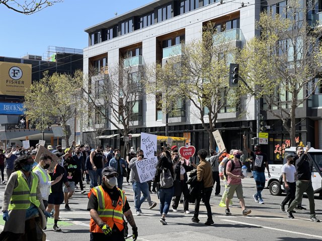 A Parade of People on a Sunny San Francisco Street