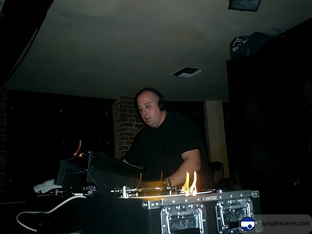 AK1200 Spinning Tracks on the DJ Mixer