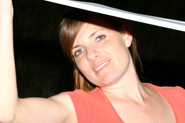 Young Woman Looking Up in Night Portrait