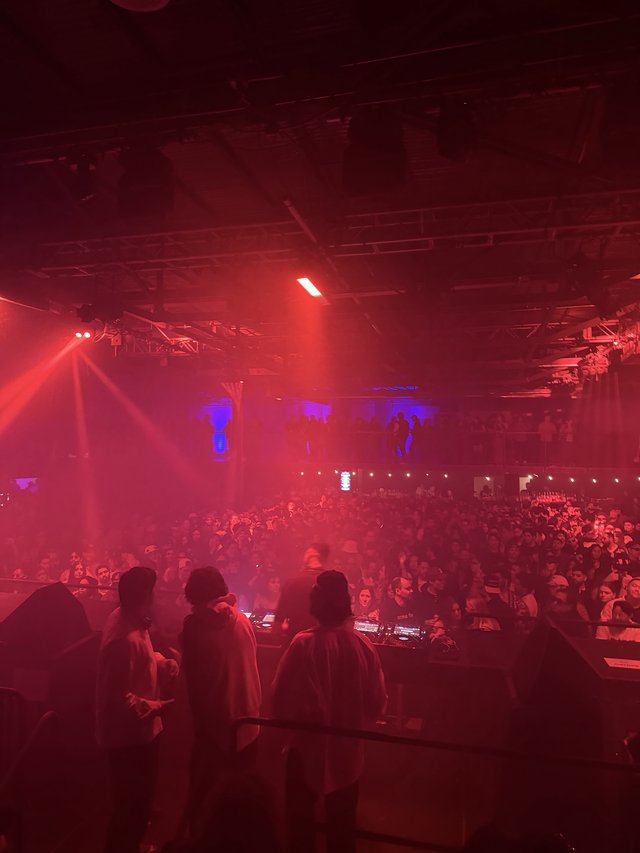 Skrillex and Four Tet Concert Bathed in Red Light