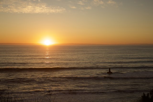 The Solitary Surfer at Dusk