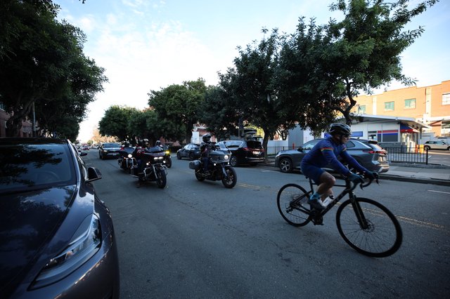 Urban Evening Commute: Cyclists and Motorcyclists Share the Road