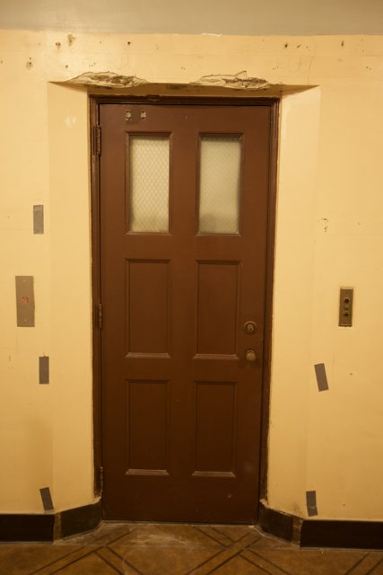 The Welcoming Brown Door