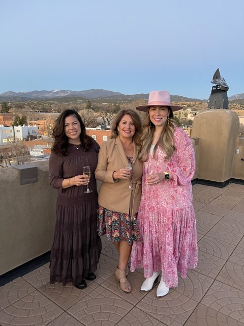 Three Women Posing for an Outdoor Portrait in Santa Fe
