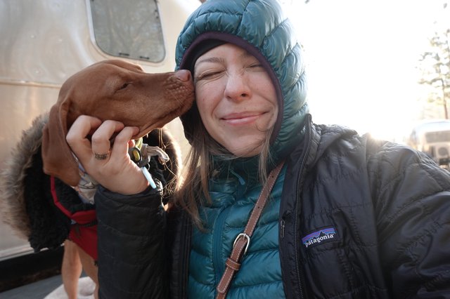 Happy Moment with Dog in Winter Setting