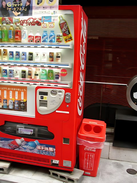 Red Vending Machine at Gas Station