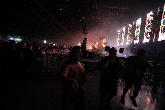 Crowd Surfers Rush Through Wobbleland Festival Pit